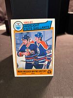 Front of 1983-84 O-Pee-Chee #23 card showing Gretzky and Messier
