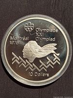 Reverse side showing Olympiade XXI Olympiad Montréal 1976 design and denomination