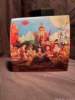 Full view of 8"x8" lenticular cover standing upright