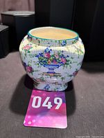 Front view of Royal Winton Pelham chintz jam jar showing pattern and shape