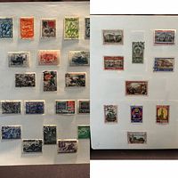 Overview of album page with approximately 20 Soviet WWII era stamps