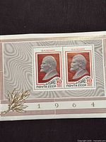 Full view of miniature sheet showing two stamps and margin