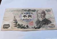 Obverse of Series B 1000 yen note with portrait, serial DE3070566