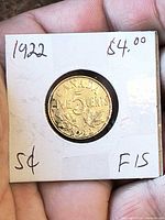 Reverse side showing year 1922, denomination and maple leaves