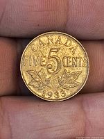 Reverse showing CANADA FIVE CENTS 1933 with maple leaves