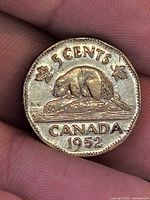 Reverse of 1952 Canadian 5-cent coin showing beaver design