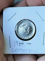 Reverse showing leaping rabbit, denomination and dates 1867-1967