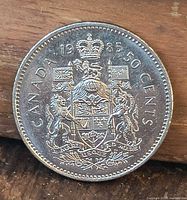 reverse showing Canadian Coat of Arms and 1985 date