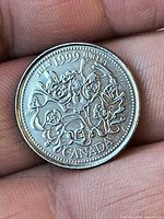 Standard nickel-finish July 1999 quarter reverse