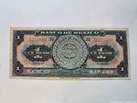 Front of Banco de Mexico 1 peso note showing serial, date, Aztec Sun Stone