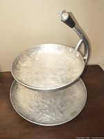 Full view showing both tiers and handle