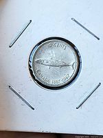 Reverse of 1967 Canadian 10-cent fish dime in 2x2 holder