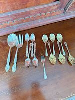 All 13 flatware pieces laid out