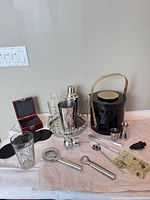 Full lot showing ice bucket, shakers, tray and tools