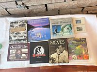 All nine books laid out front covers visible