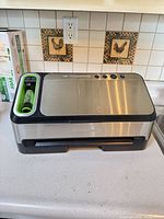 Front view of FoodSaver V4825 on countertop