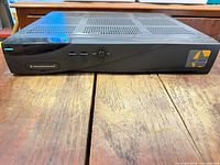 Front view of General Instrument DSR401MN receiver showing controls and logo