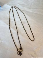 Full view of sterling silver chain necklace with clasp