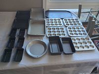 Group of all bakeware items laid on table