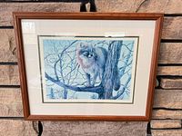 Full view of framed print on wall