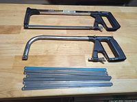 Top view of both hacksaw frames and blades