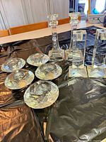 Group of all candlesticks and tealight holders on table