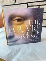 Front view of the hardcover book showing title and artwork