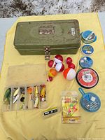 Overall lot layout: tackle box, tackle organizer, line spools, bobbers, jig heads