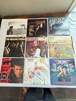 All nine album covers laid out 3x3 grid