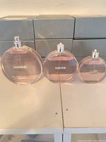 Front view of three Chanel Chance Eau Tendre bottles in 150 ml, 100 ml, 50 ml sizes