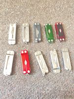 Ten closed Micra multi-tools arranged in two rows showing color mix