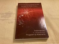 Front cover showing title, organizations, date, location