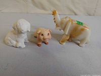 Front view of all three animal figurines