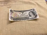 Obverse of Bank of Canada one-dollar bill