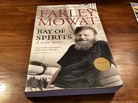 Front cover showing title, author name, subtitle, author photograph, award sticker