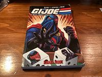 Front cover of G.I. Joe Volume 24 Snake Hunt paperback
