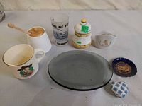 All eight home decor and drinkware items arranged on table