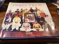 Front dust jacket side India Then with historic group photo