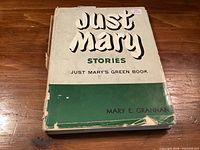 Front cover showing title, author, wear