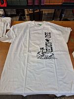 Front of white T-shirt showing Bear Hunter graphic