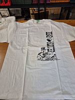 Front of T-shirt showing full graphic and size