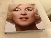 Front view of the Marilyn Monroe hardcover book with dust jacket