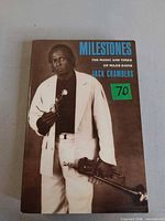Front cover showing title, author and image of Miles Davis