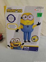Front of retail box displaying Minions Bob child costume details