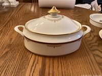 Top and side view of Minton Gloucester covered vegetable bowl showing pattern, handles, lid and finial