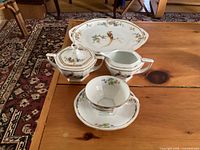 Group view of all five porcelain pieces