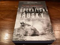 Front cover showing title, author, subtitle and wartime photograph