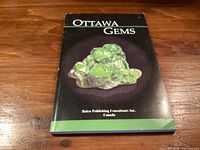 Front cover showing title and gemstone image