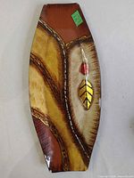 Front view of elongated painted glass tray