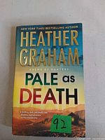 Front cover showing title, author, and series